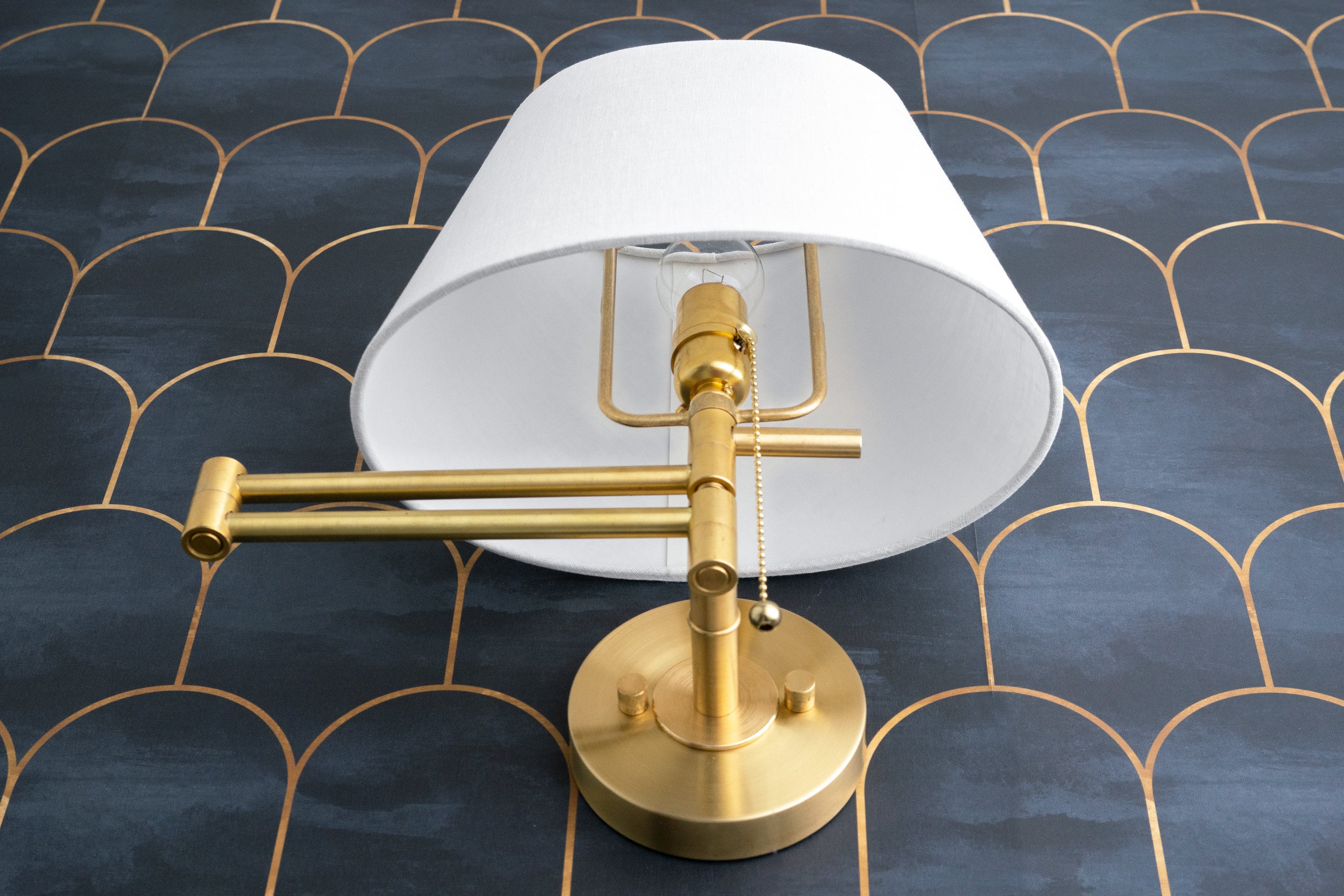 Ornato Luxe Brass Schoolhouse Sconce - Art Deco Wall Light with White Shade