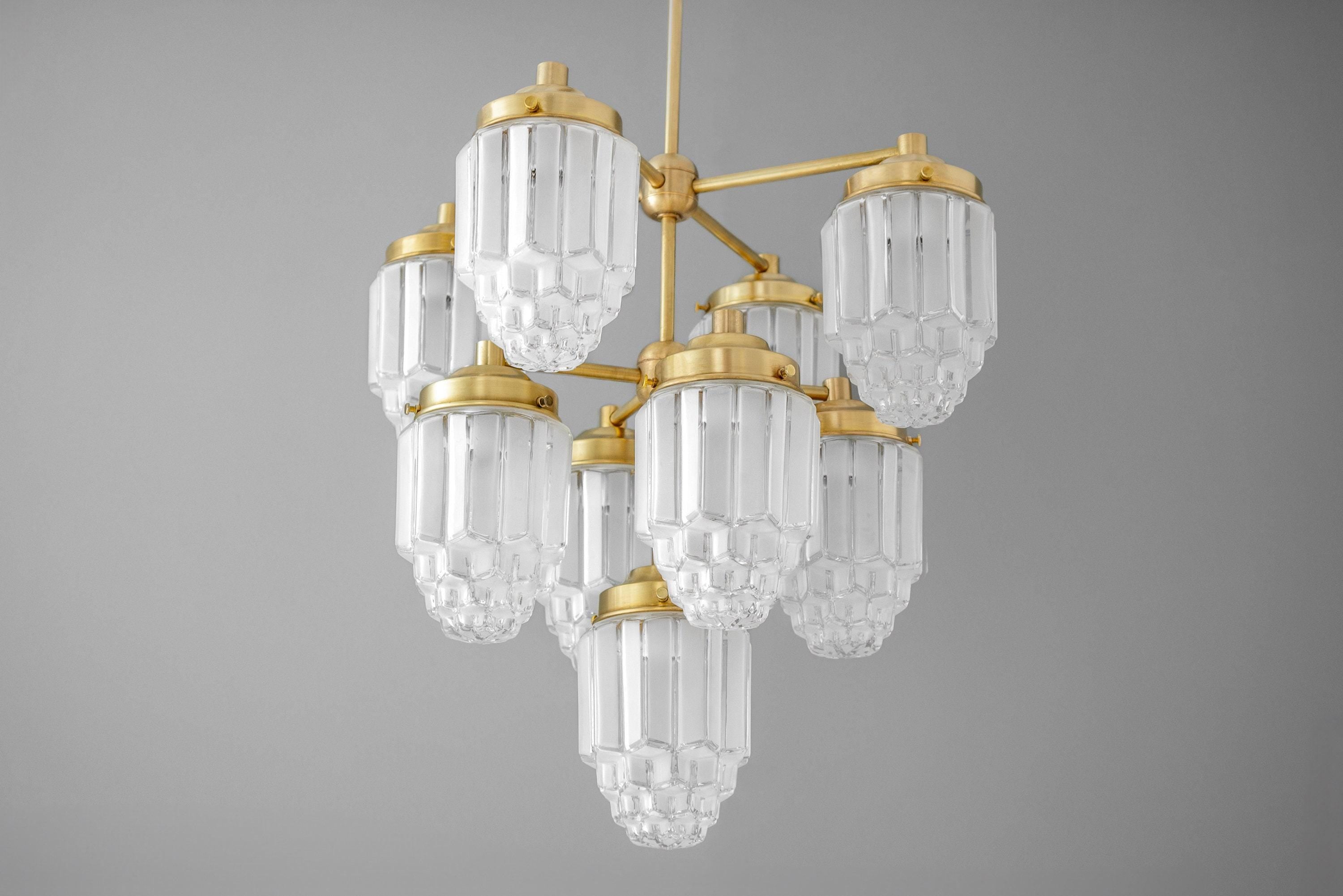 Tierlux Glass Textured Brass Chandelier – Timeless Lighting with Style