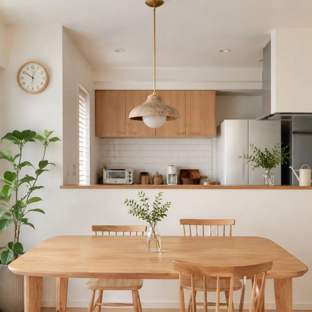 Pendant lamp over a warm wood dining table