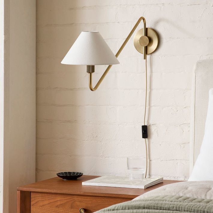 Diora Champagne Bronze Sconce - Plug-In Adjustable Arm Linen Bedside Lamp