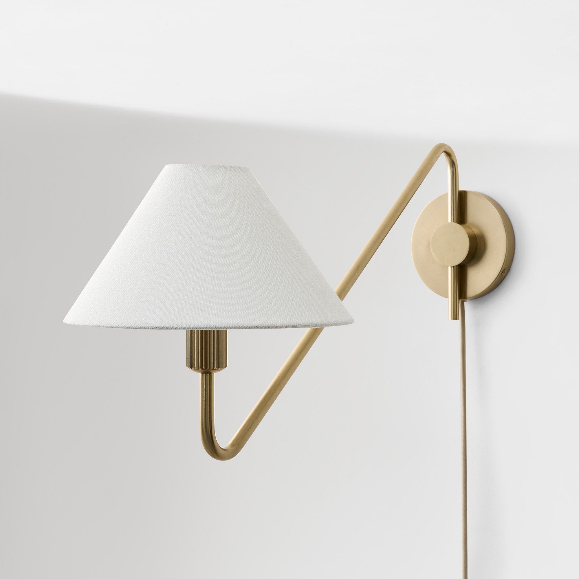 Diora Champagne Bronze Sconce - Plug-In Adjustable Arm Linen Bedside Lamp