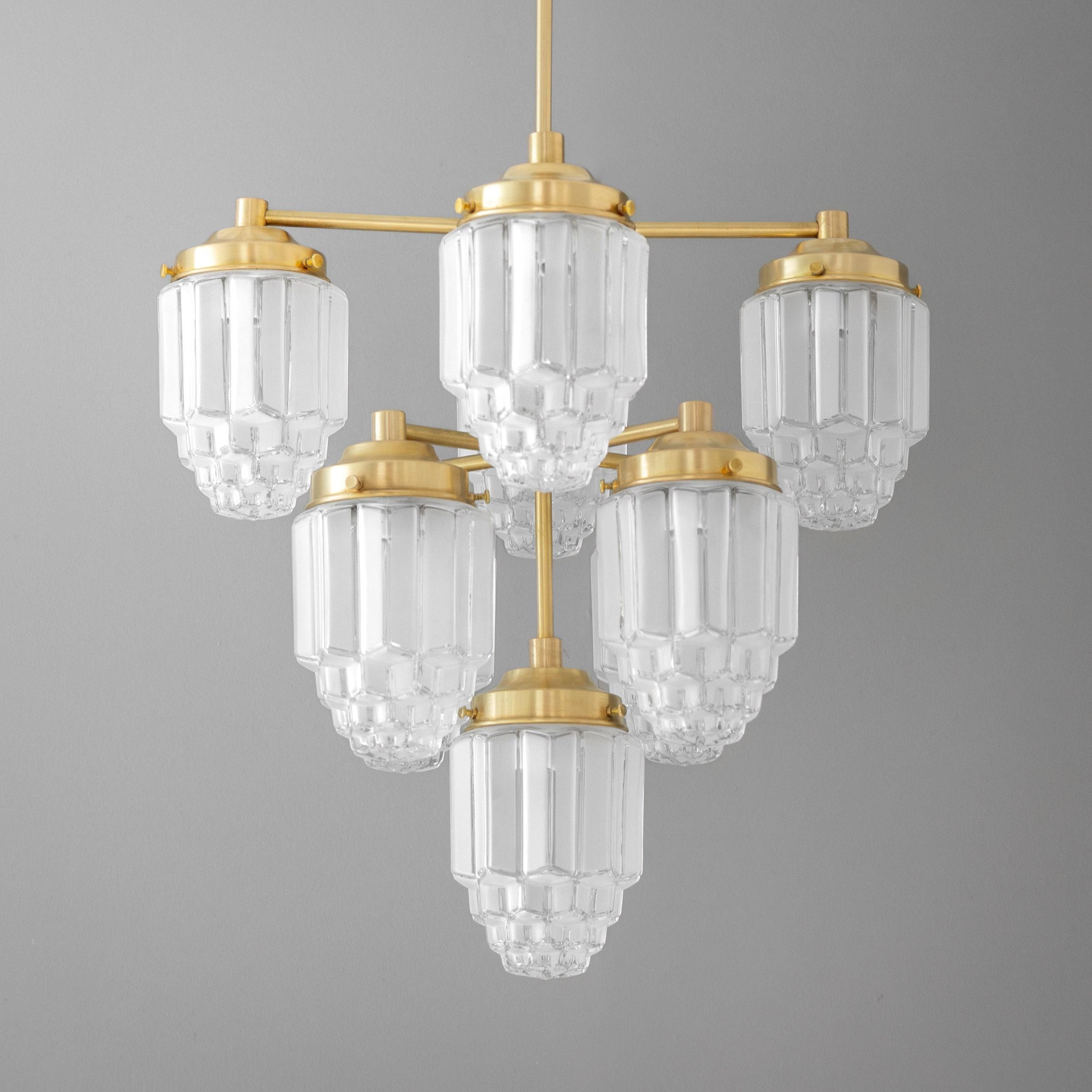 Tierlux Glass Textured Brass Chandelier – Timeless Lighting with Style