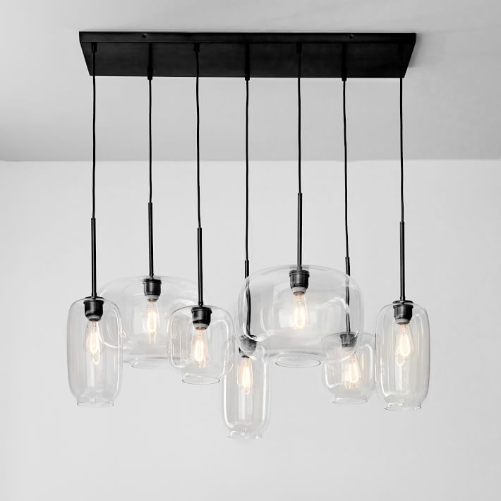 Lumivelle Sculptural 7-Light Chandelier – Adjustable Height Modern Glass Pendant
