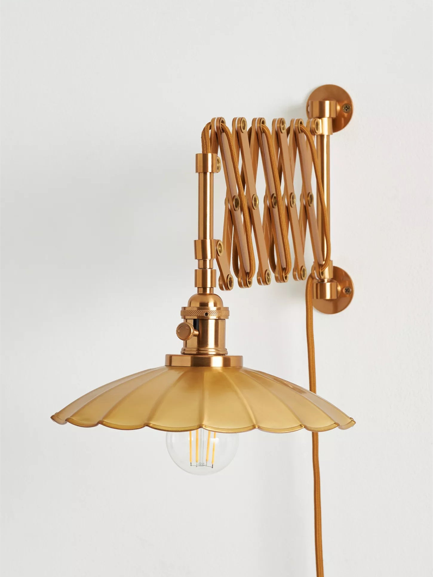 Furium Scalloped Accordian Plug-In Sconce - Brass Wall Light Elegance