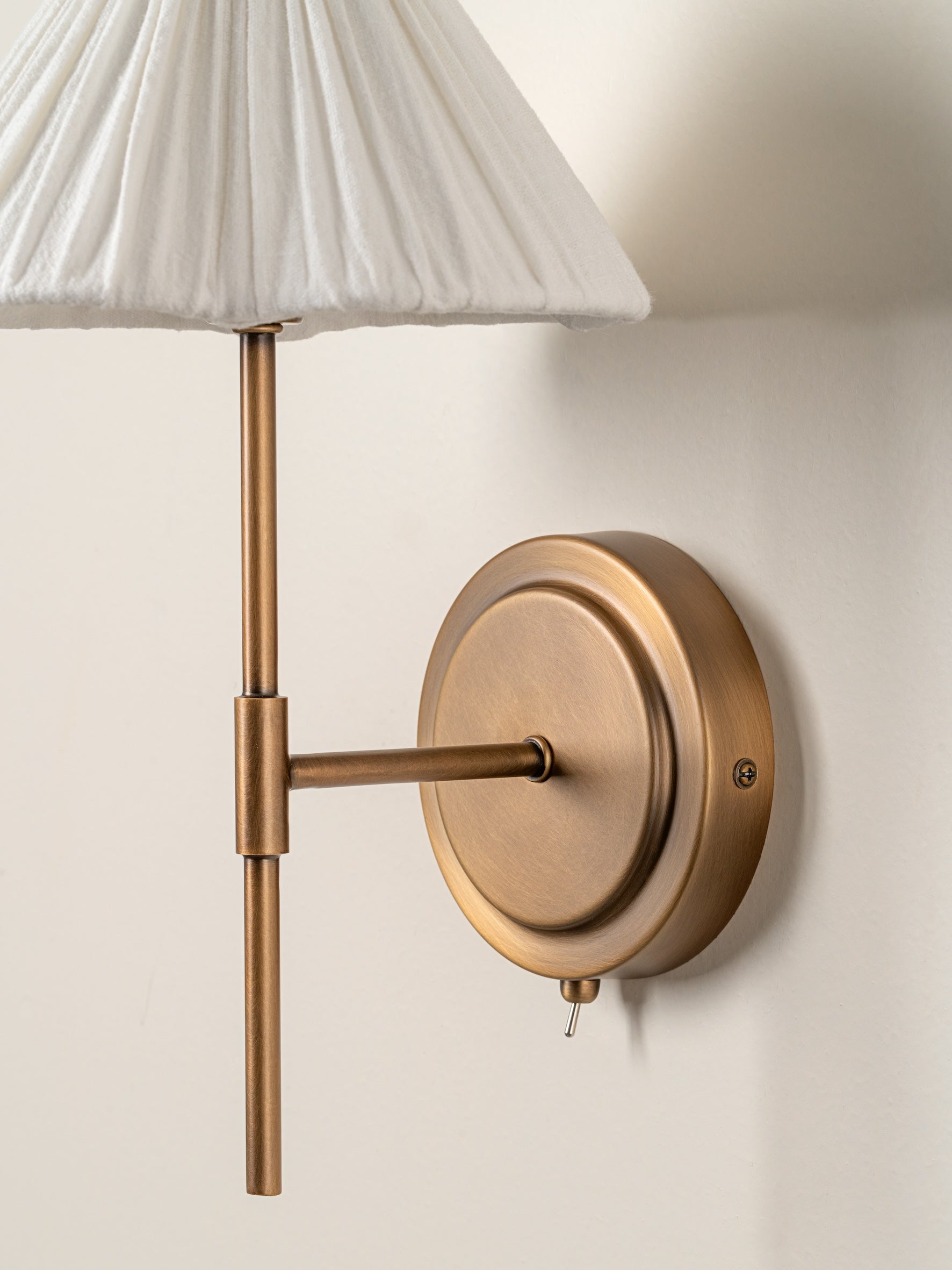Lindi - Aged Brass and Linen Scalloped Wall Light