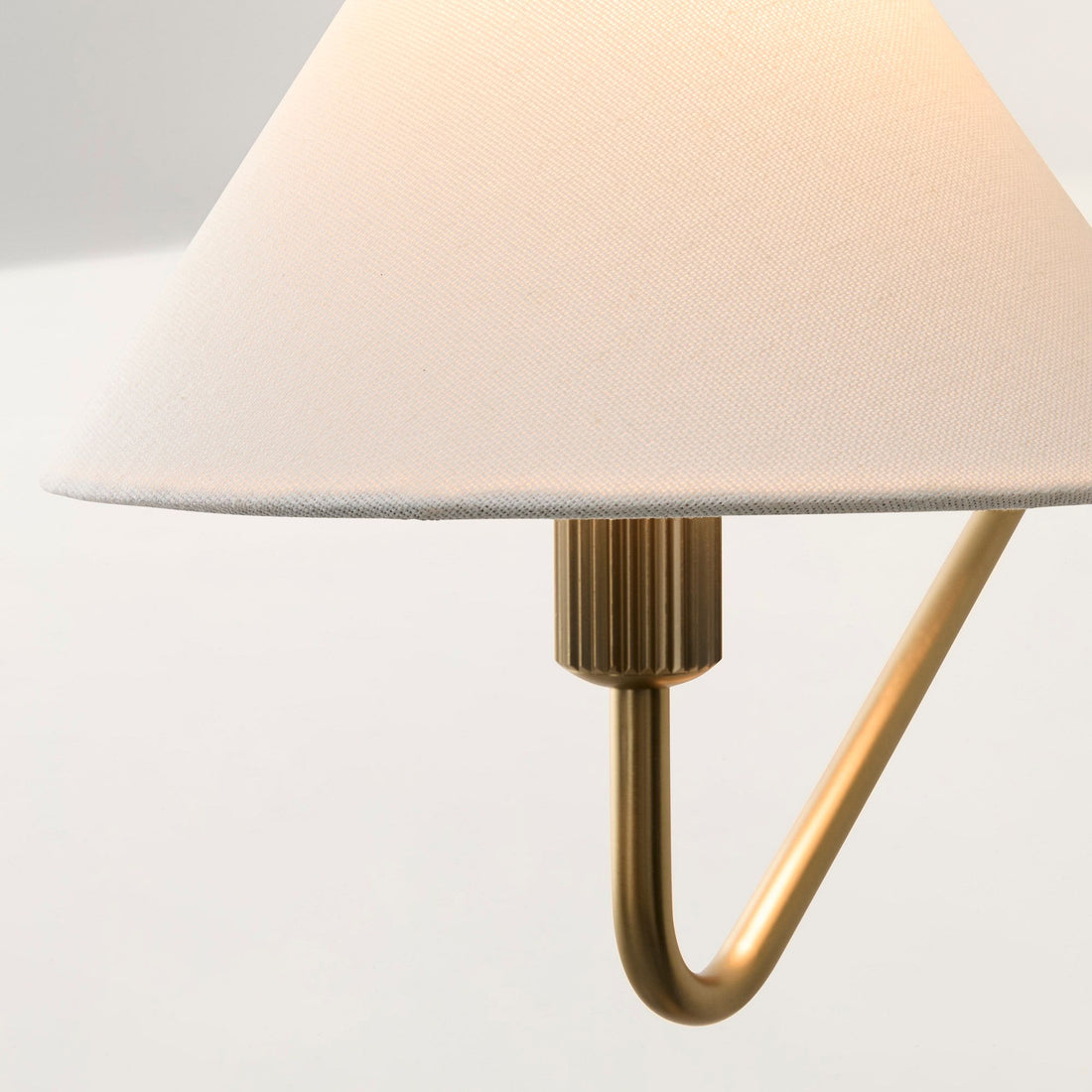 Diora Champagne Bronze Sconce - Plug-In Adjustable Arm Linen Bedside Lamp