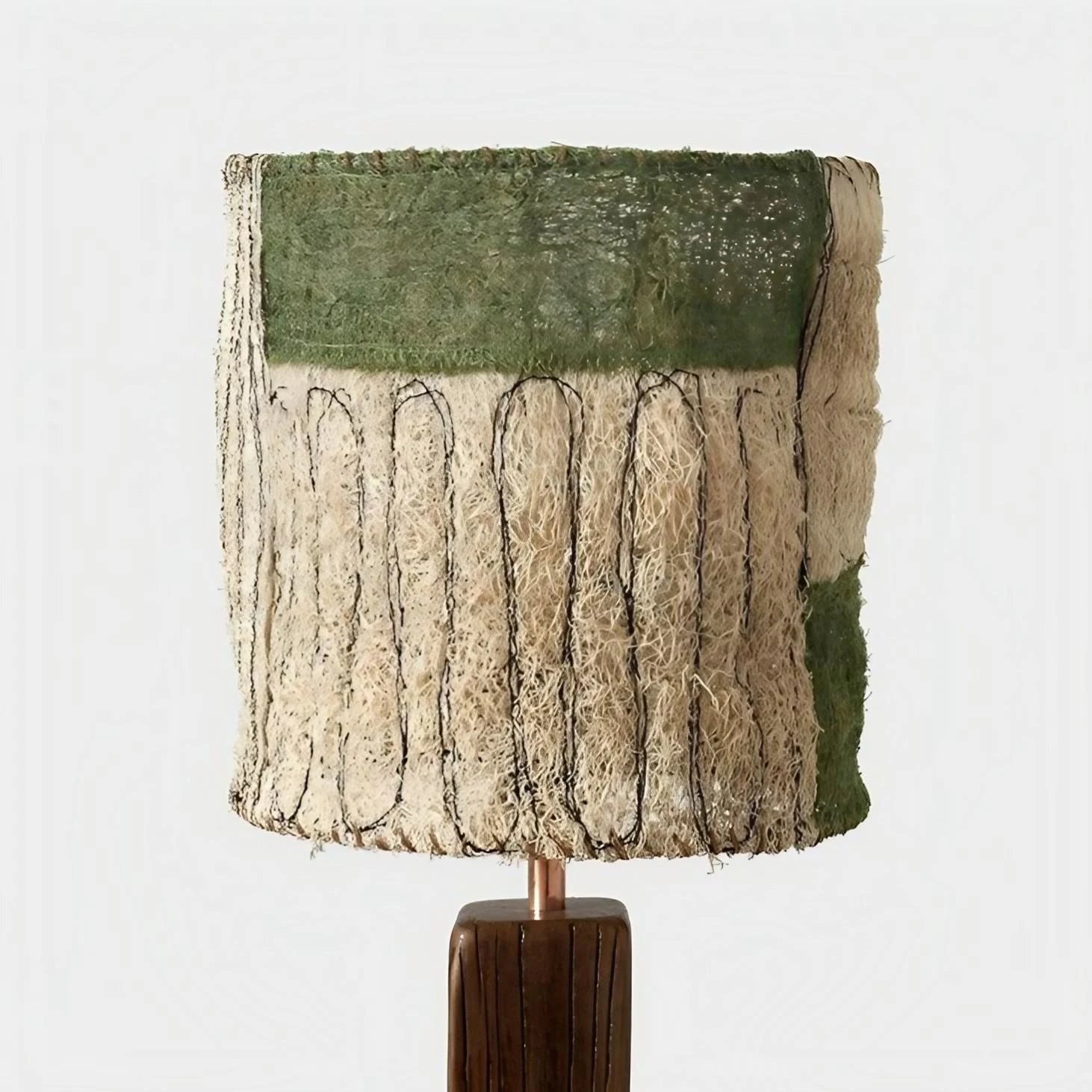 Handwoven loofah table lamp with green panel shade