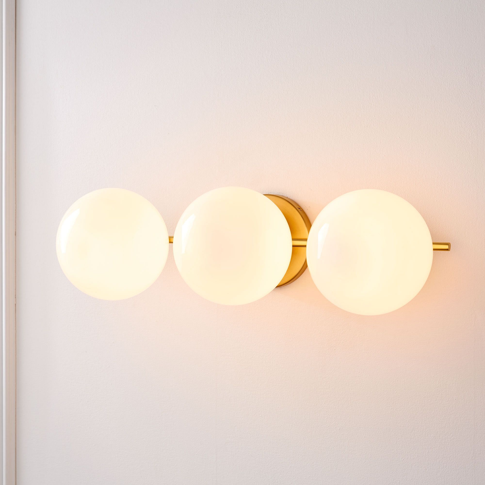 Alessora Mid-Century Modern 3-Light Wall Sconce - Metal Frame White Glass Globes
