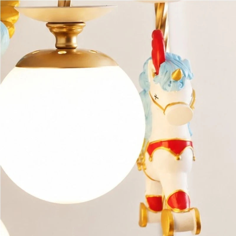 Close up of frosted glass globe shade and unicorn ornament