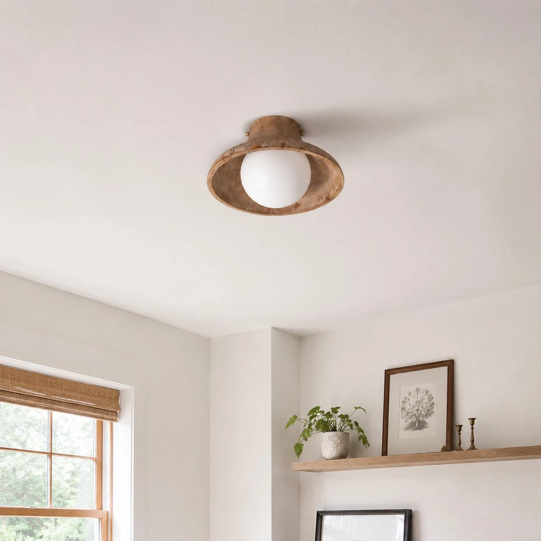 Natural wood ceiling light in a calm room setting