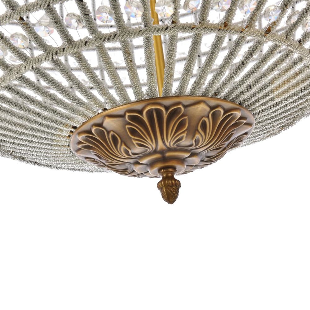 Lustre globe en cristal et laiton vintage pour un éclairage sophistiqué
