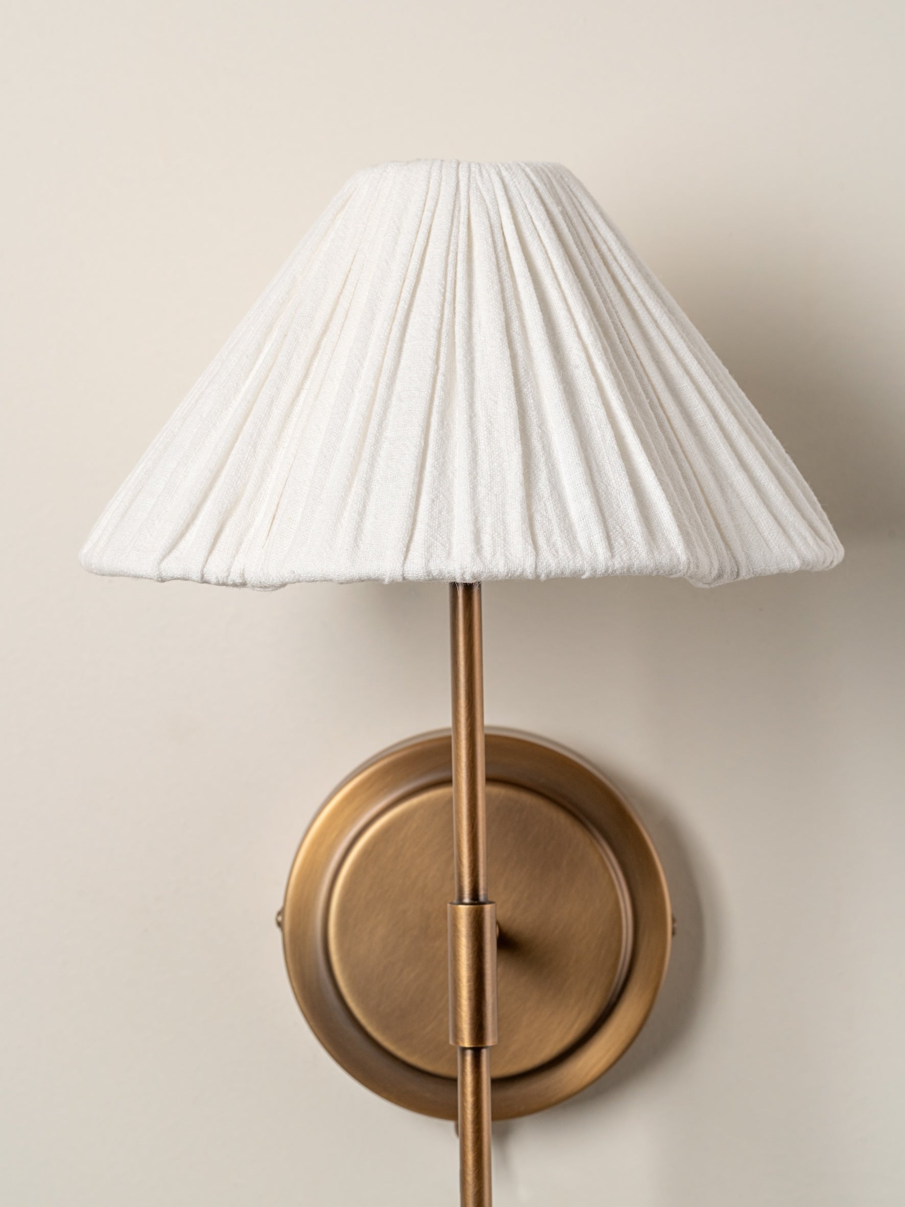 Lindi - Aged Brass and Linen Scalloped Wall Light