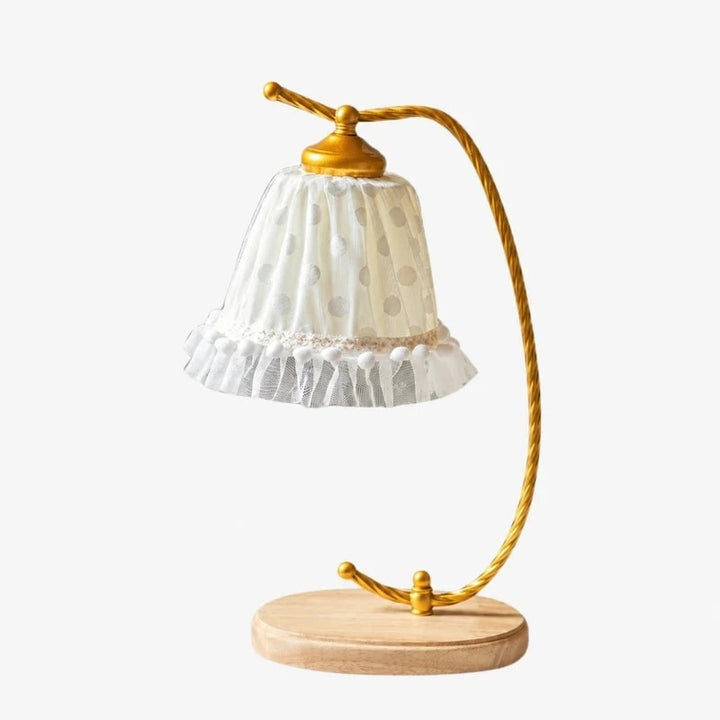 Full product view of the vintage lace table lamp with gold curved arm and wood base