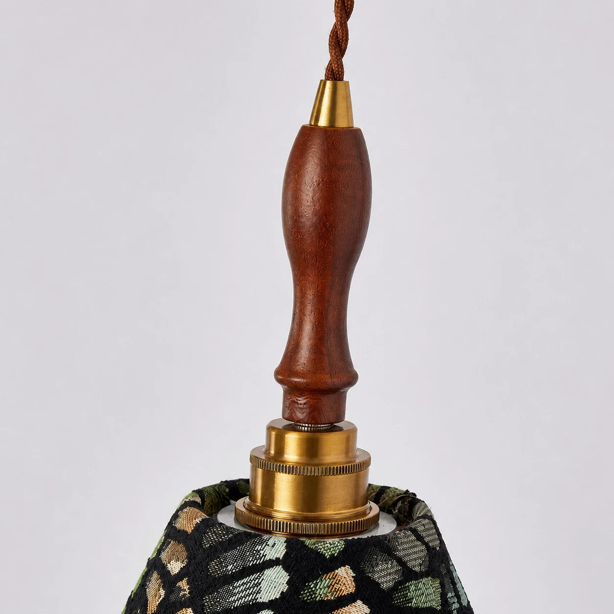 Fabric shade and wood hardware detail
