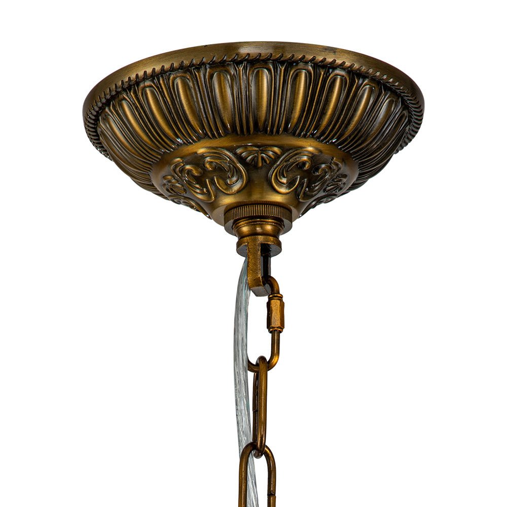 Lustre globe en cristal et laiton vintage pour un éclairage sophistiqué